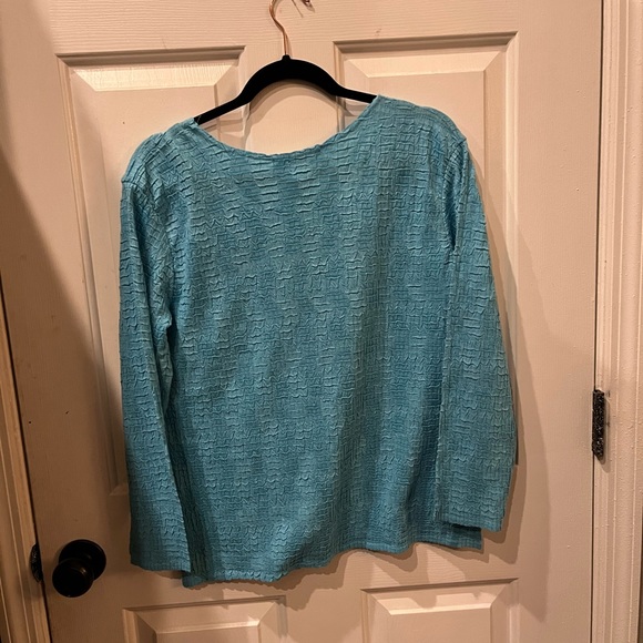 Gorgeous Caribbean blue too. Stretchy but holds its shape. So comfortable - Picture 3 of 3